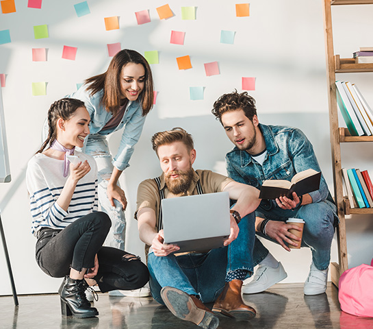 diverse business team researching ideas in light